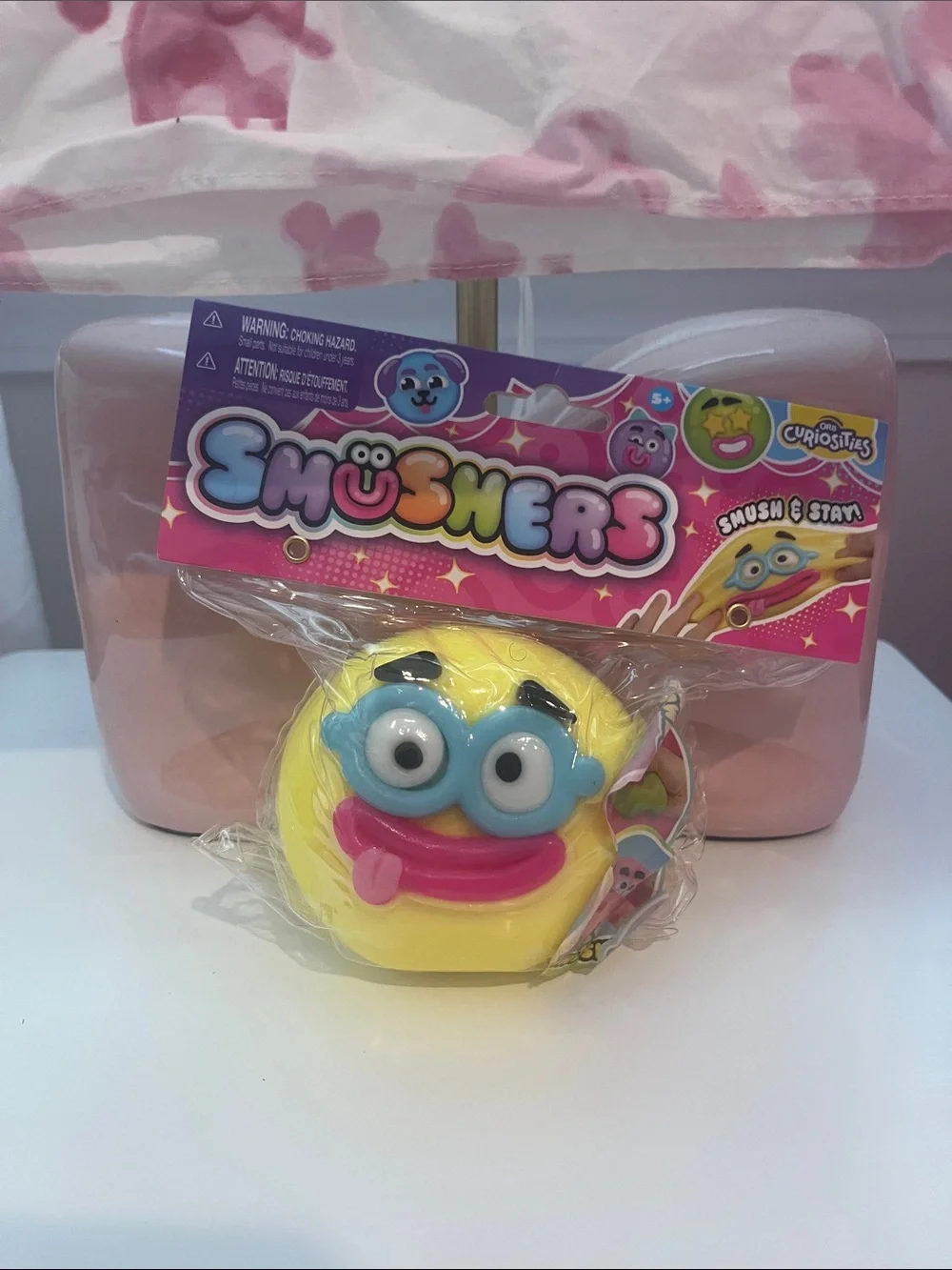 Smusher Yellow Smushers Emoji Squeeze Toy with Blue Eyes and Pink Mouth